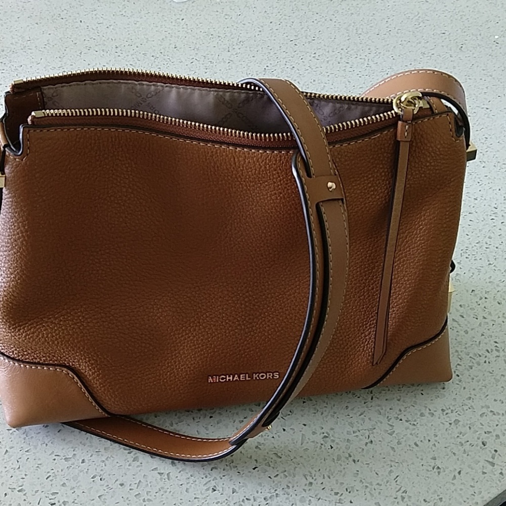 Michael kors medium size brown handbag